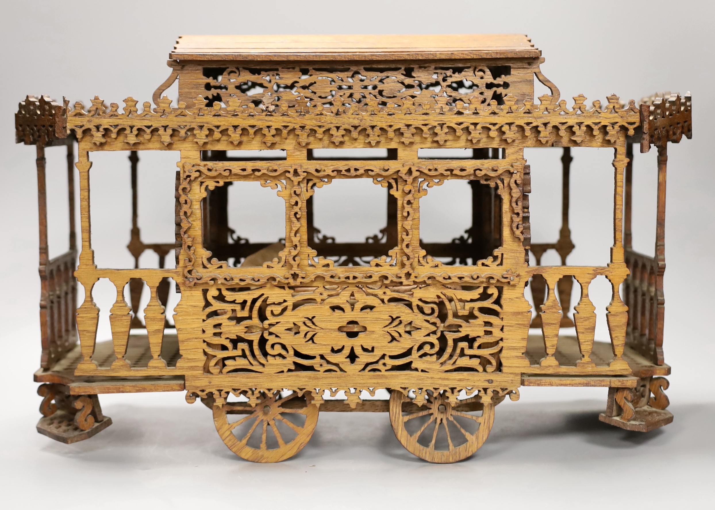 An early 20th century fretwork model of an American street car, 45cm